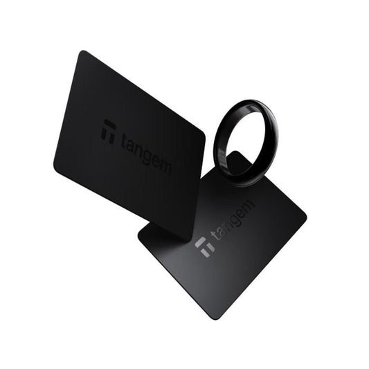 Black Tangem hardware wallet components on a white background