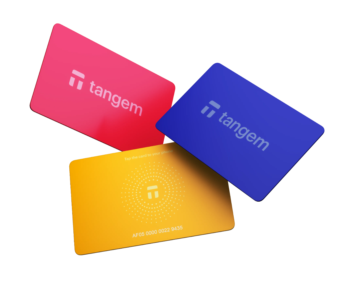 Three Tangem cards in red, blue, and yellow on a white background